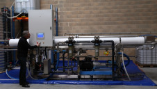 Inventor of water technologies Marc Vergnet adjusts the controls on Osmosun, his new solar-powered reverse osmosis desalination system that does not use batteries or energy storage, chemicals, or grid supplies of electricity